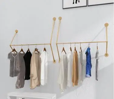 

Golden clothing store display stand on the wall side wall-mounted women's clothing store clothing rack shelf clothes rack hanger
