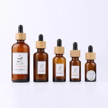 

Engraving logo bamboo ring top Luxury 10ml 20ml 30ml 50ml 100ml Amber frosted Glass Dropper Essential Oli Bottle with Bamboo Lid
