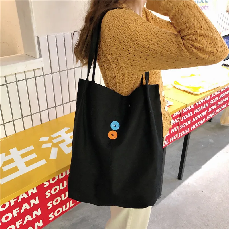 

Women's canvas shoulder bag color button decoration student casual handbag large capacity shopping bag