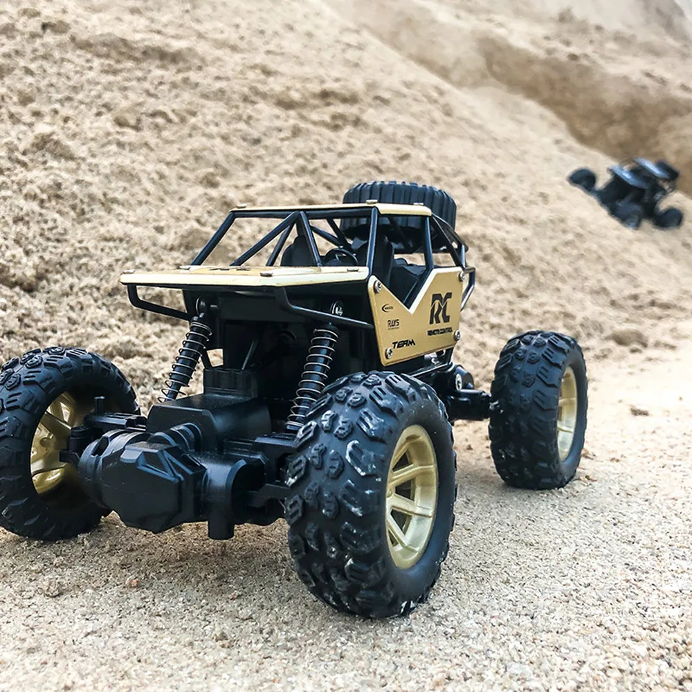 1/18 2.4GHZ 4WD Radio Remote Control Off Road RC Car ATV Buggy Climb rc car Gift for kids toys juguetes brinquedos игрушки New 1/18 2.4GHZ 4WD Radio Remote Control Off Road RC Car ATV Buggy Climb rc car Gift for kids toys juguetes brinquedos игрушки New