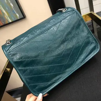 

Los diseñadores de marca diseñan bolsas de cuero de alta calidad con gran capacidad para crear bolsos