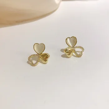 

New Style S925 Silver Needle South Korea Immortal Fashion and Personality Light Luxury Cat's Eye Stone Transparent Flower Earrin