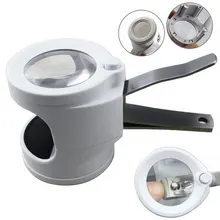 nail clipper with magnifier