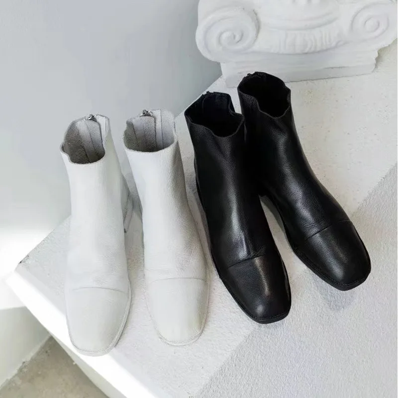 

Autumn - winter 2019, the new 100 square - heeled rear zipper boots Chelsea boots.