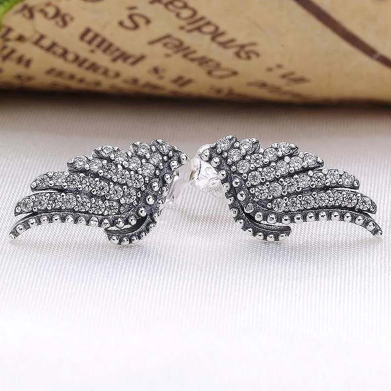 

Серьги-гвоздики женские из серебра 925 пробы с кристаллами