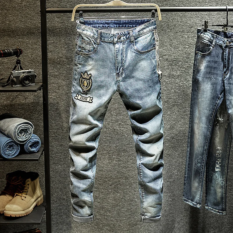 

Spring light color embroidered jeans men's fashion brand Slim small feet elastic net red men's pants