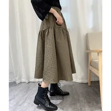 Autumn/winter 2021 Jacquard fabric temperament commuter skirt solid color patchwork brown dress