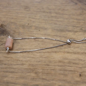 Capture the essence of tranquility and elegance with our Sunstone Crystal Bracelet. This image serves to showcase the exquisite craftsmanship and natural beauty of the bracelet, highlighting the soothing sunlit tones of genuine Sunstone. The purpose is to convey the harmonious blend of style and metaphysical virtues, inviting individuals to explore a daily companion that not only enhances their aesthetic appeal but also fosters inner peace, communication, and spiritual balance. Immerse yourself in the visual allure of the Sunstone Crystal Bracelet and envision the elevated sense of sophistication and mindfulness it brings to your life.