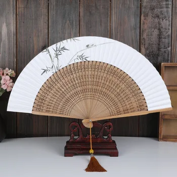 

New Chinese elegant solid wood printed rice paper fan is simple, elegant and unpretentious paper hand fan folding hand fans