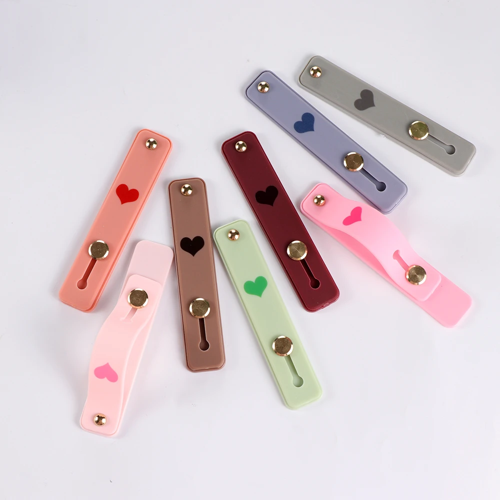 

Silicone Phone Holder Finger Ring Push Stretch Pull Grip Stand Heart Candy Color Bracket Buckle Wrist Mobile Universal Hand Band