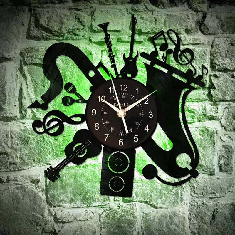 Часы banda. Часы для музыкантов. Постеры на музыкальную тематику. Часы музыка бой. Часы из винила queen.