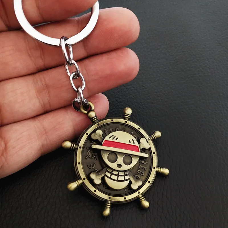 

CWFDY Japan Anime One Piece Key Chain Rotatable Luffy Straw Hat Skull Metal Pendant Keyring Holder Men Women Jewelry Wholesale