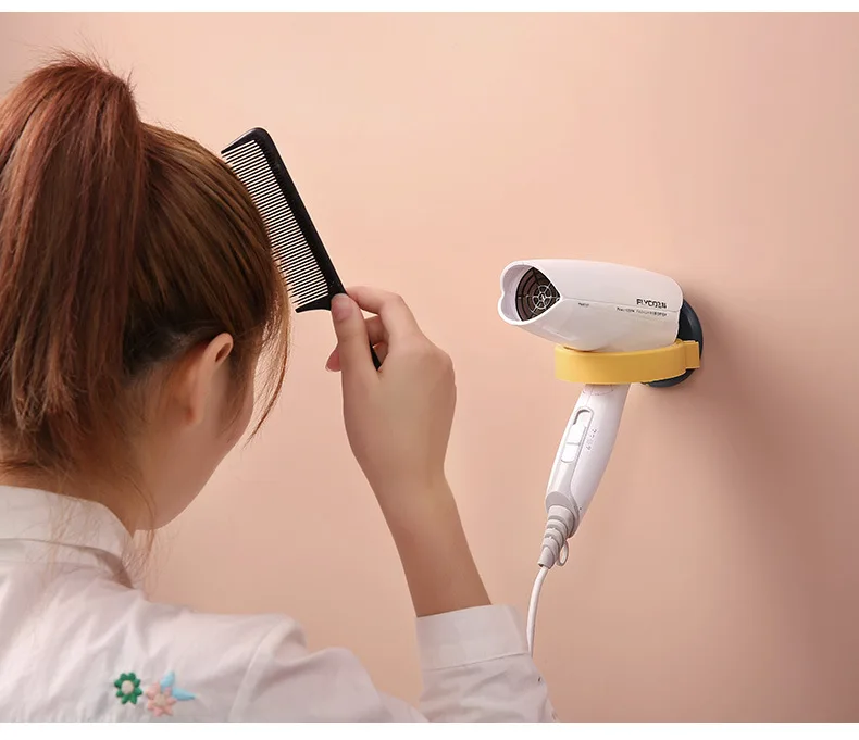 Bathroom hair dryer rack