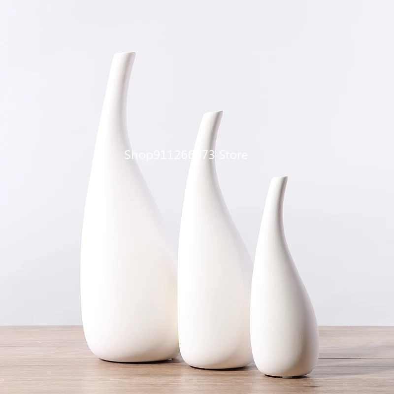 

Nordic decoration home white flower vase ins small fresh simple modern living room home decoration flower arrangement Ceramics