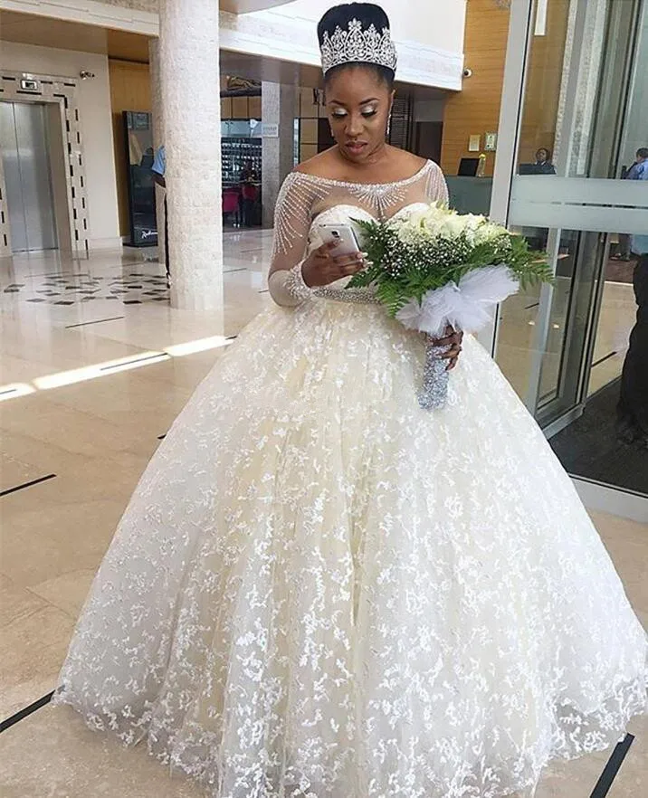 

A-line African Wedding Dresses For Nigerian Bride 2019 Middle East Church Long Sleeves Wedding Gown Sweep Train Beads Crystals
