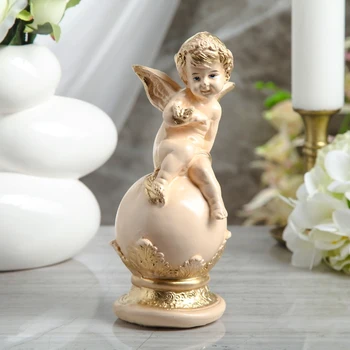 

Figurine "Angel on a ball with a butterfly" 23 cm, beige