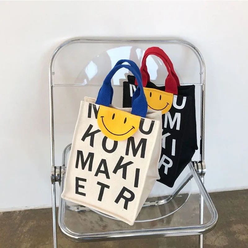 2022 Canvas bag New Summer Korean Japanese Cartoon Canvas Smile Handbag Large Capacity Shoulder Bag Hit Color Letter Female Tote