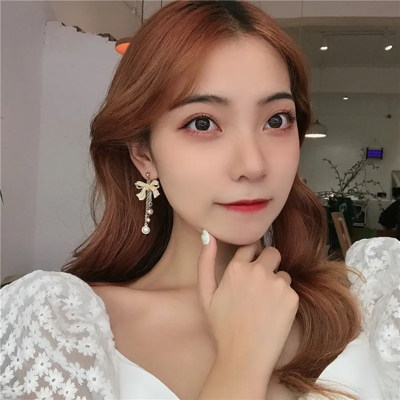 Korean Bow Shape Imitation Pearl Clip on Earrings 2020 Rhinestone Bowknot Long Pearl Tassel Clip Earrings Without Piercing Women