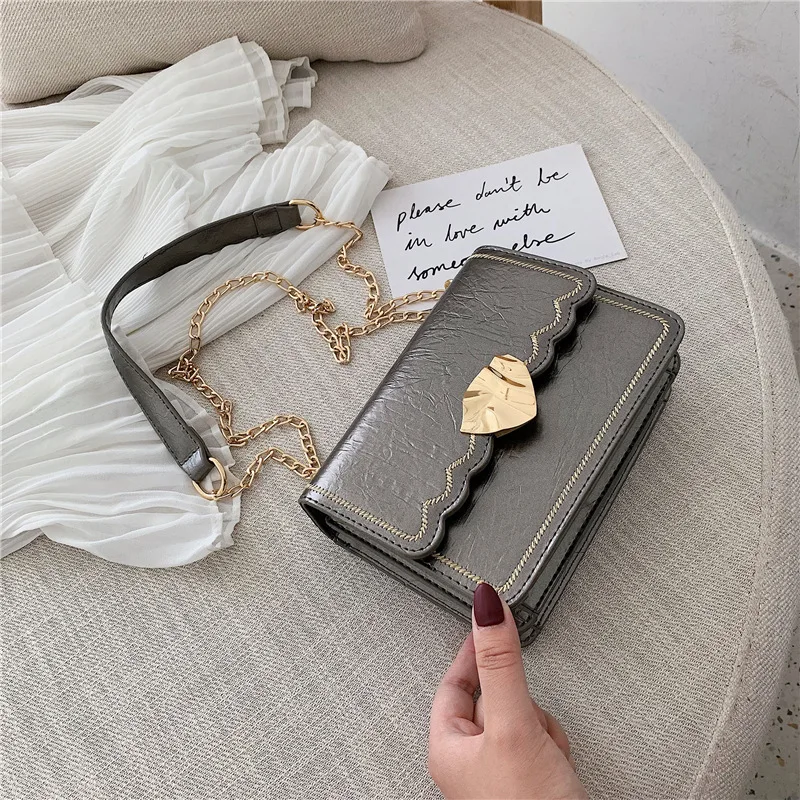 Irregular leaf magnetic buckle women's bag new summer small fresh car stitching shoulder slung chain small square bag - Цвет: Серый