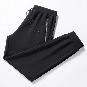 

MOGU New Spring Autumn Men Casual Sweatpants 2020 Mens Sportswear Joggers Pants Fashion Male Loose Slim Fitted Gyms Harem Pants