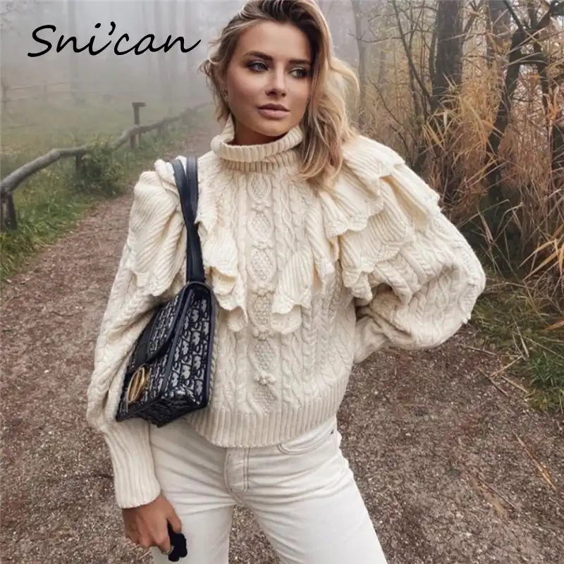 cable knit sweater with ruffles