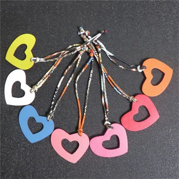 

Handmade Hollow Out Genuine Leather Heart Keychain Women Real Silk String Luxury Two Color Leather Bag Charms Pendant Key Ring