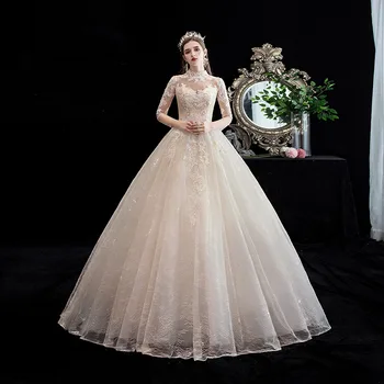 

Gorgeous Applique Lace Wedding Dresses elegant champagne color Wedding Dress Sexy Nail bead Princess Bride Wedding Gown