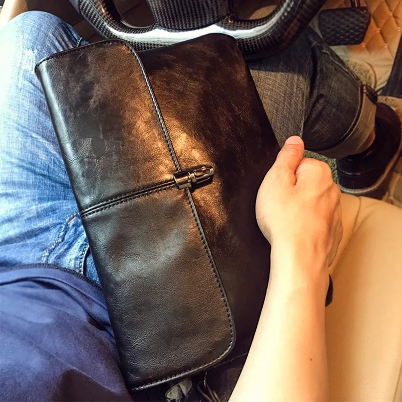 

Men's clutch bag fashion Korean version of the trend of the wrist packet 2019 new JIULIN