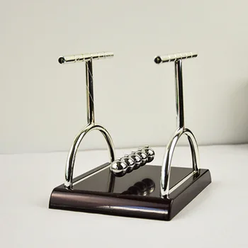 

Newton Cradle Perpetual Bumper Figurines Swinging Ball Classic Office Desktop Balance Ball Children Early Education Holiday Gift