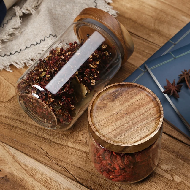 Pot en verre avec couvercle en bois de stockage contenant