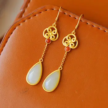 

Natural Hetian white jade long drop shaped earrings Chinese knot ancient Bohemian light luxury noble silver jewelry