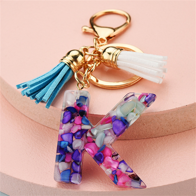 Women Keychains 26 Glitter Hollowed-out Words Handbag Tassel English Letter Keyring with Puffer Ball Charms Free Shipping