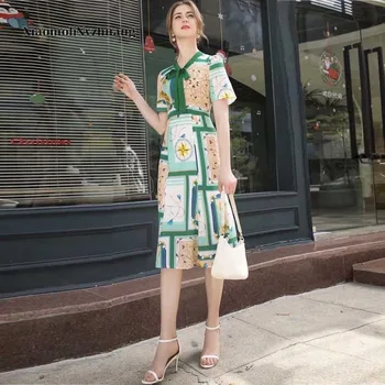 

Xiaomoli Bow neck short sleeve slim series printed striped temperament women's dress 2020 summer new