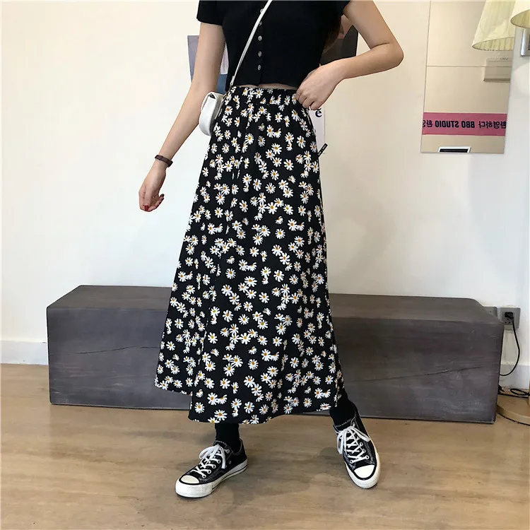 

VICONE restore Little Daisy printing show thin half-length skirt of tall waist
