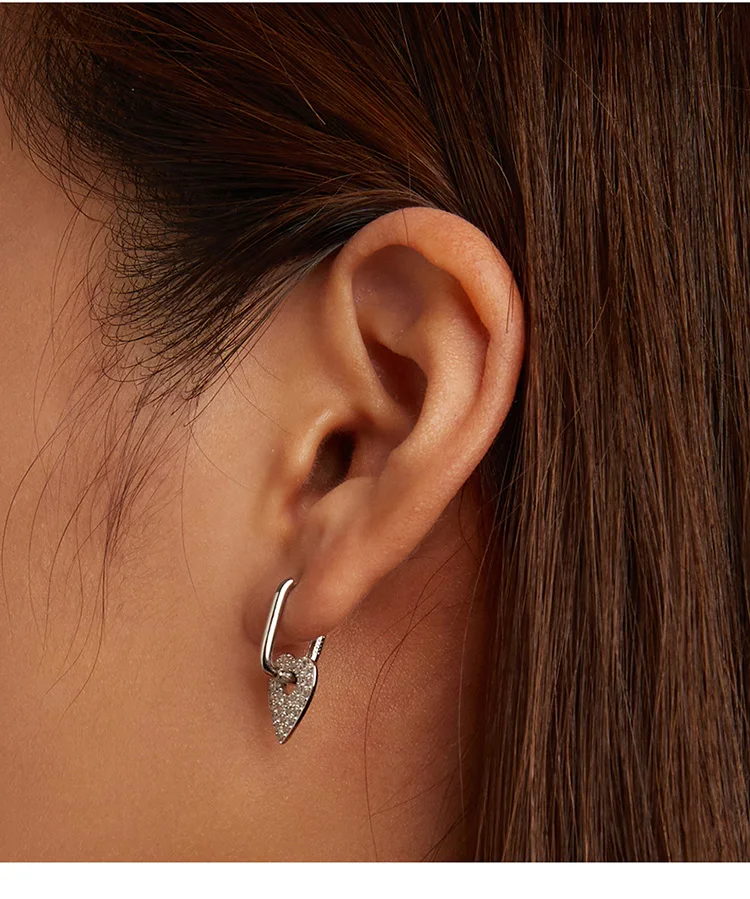 Heart Rectangle Hoop Earrings | S925 Sterling Silver | Go Glam Girl 12 Heart Rectangle Hoop Earrings | S925 Sterling Silver | Go Glam Girl - Show your style with the delicate Heart Rectangle Hoop Earrings. Hand-finished in sterling silver, every hoop earring has a heart dangling on it and encrusted with small sparkling zircons. These dreamy earrings, full of a romantic atmosphere will bring mood and beauty to your day. Perfect gift for mom, sister, grandmother, friend or yourself. | 🚚 Free Standard Shipping 7-30 days | 🥇 Top Quality Product | 💎 100% S925 Sterling Silver | 🛡️ 100% Safe & Secure checkout