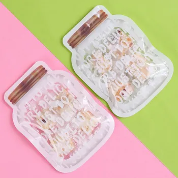 

Plastic bag 50pcs hot sale new 19x14x10cm Shaped transparent English jar snow candy cookies cranberry nougat bagged plastic bag