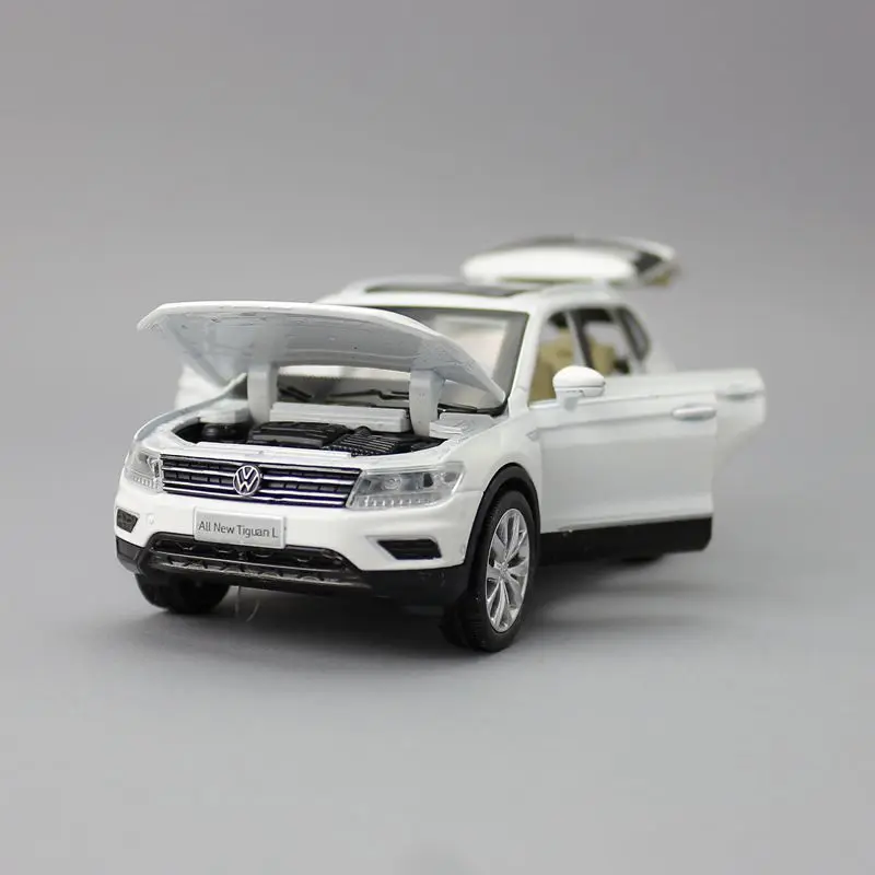 Масштаб 1:32/литая металлическая игрушка/внедорожник Volkswagen Tiguan спортивный
