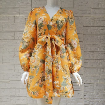 

woman yellow floral print dresses