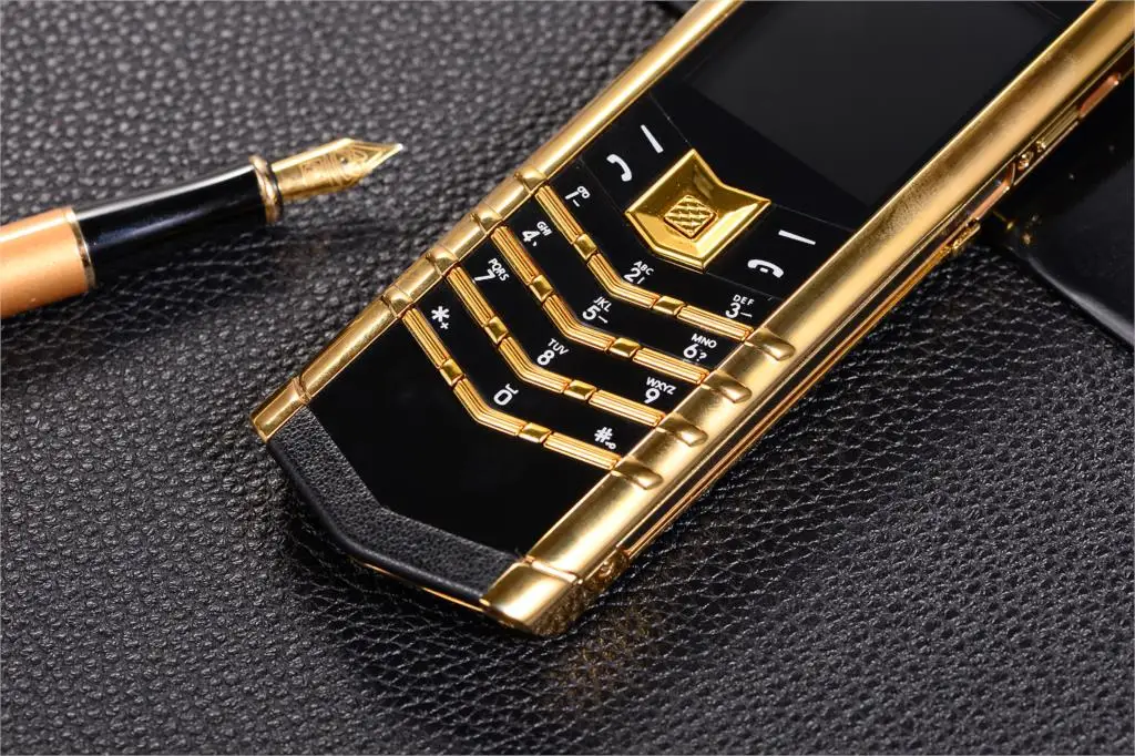 Бесплатный подарок кожаные сумки Meatl тела роскошный бар телефон V10 Dual Sim Bluetooth мобильный телефон вибрации Mp3 Mp4 FM