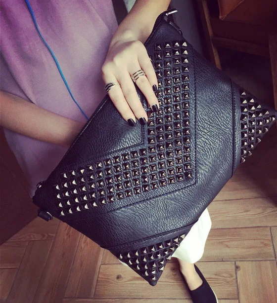 

Fashion rivet hand grasp handbag leisure business single shoulder bag