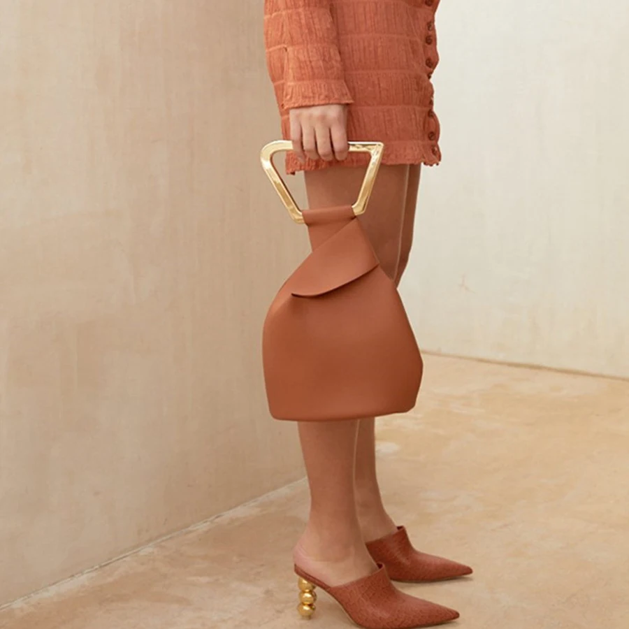 Online Bolsos de mano de acrílico personalizados para mujer bolsos de mano de cuero sólido de alta calidad para mujer nuevos bolsos de cubo irregulares de verano