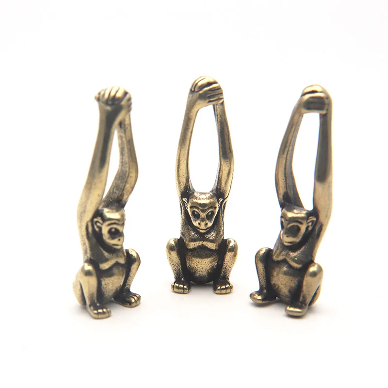 brass monkey figurines (4)