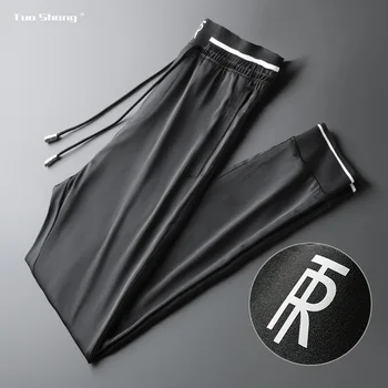 

2020 Fashion High Quality Black Casual Sweatpants Letter Embroidery Sports Pants Men Stitching Thin Ribbon Personality Trousers
