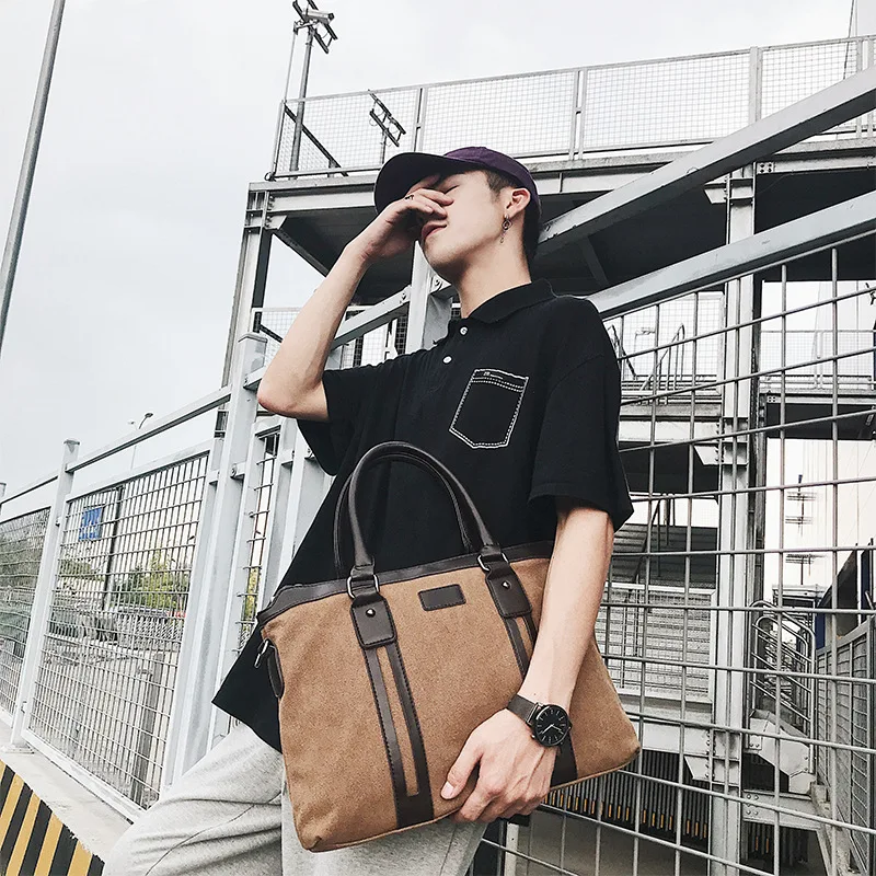 

Q Wholesale new Korean canvas male bag with one shoulder oblique satchel