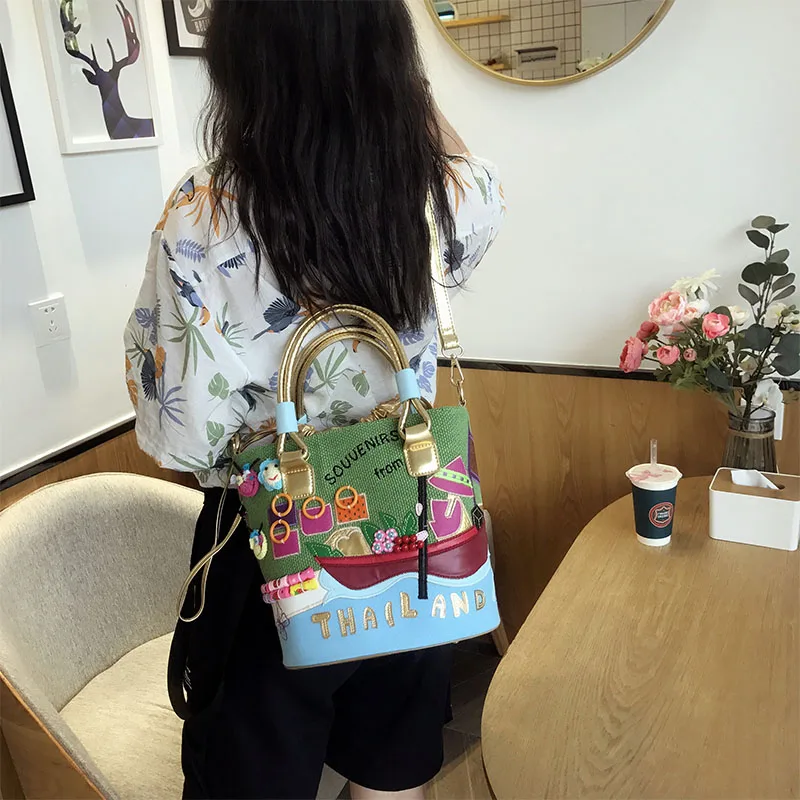 

New women's bag hand-embroidered three-dimensional decorative bucket bag ladies fashion trend handbag shoulder bag