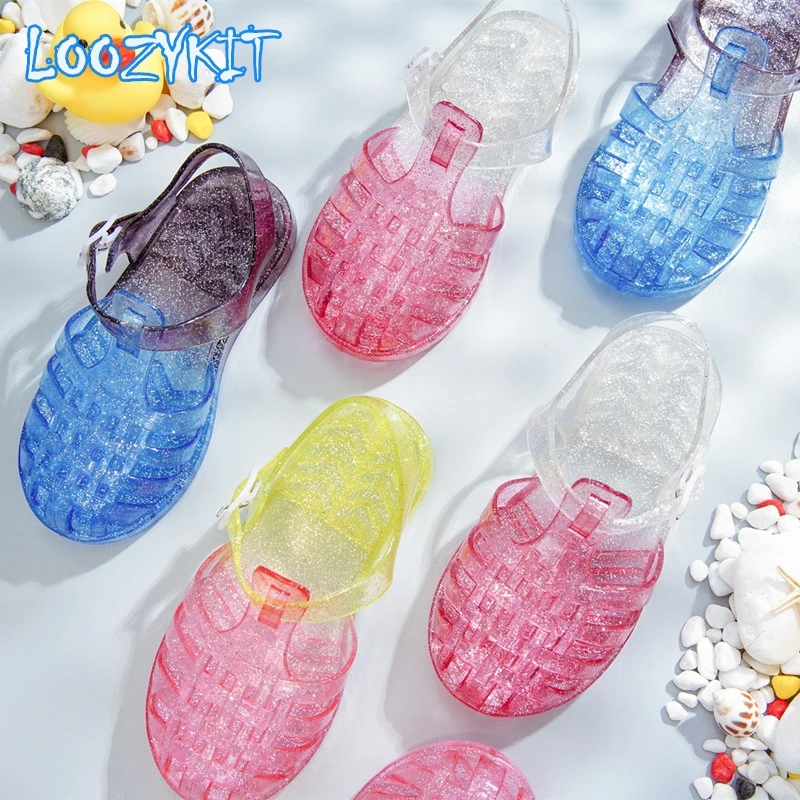 Sandalias suaves de Pvc para niños, zapatos de gladiador de cristal, informales, de tacón plano, para playa, Verano