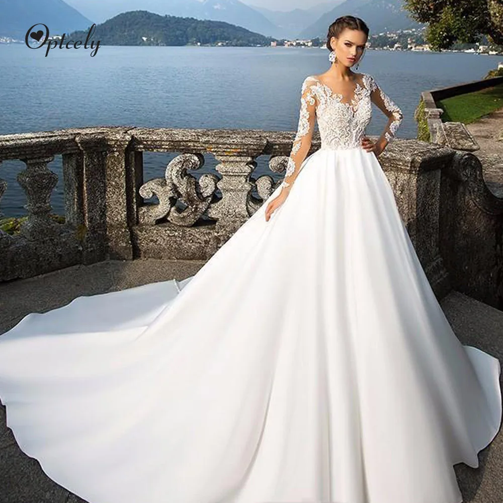 

Optcely High Quality Satin O-Neck 3D Flowers Long Sleeve A-Line Wedding Dresses 2019 Appliques Beaded Bridal Princess Dream Gown