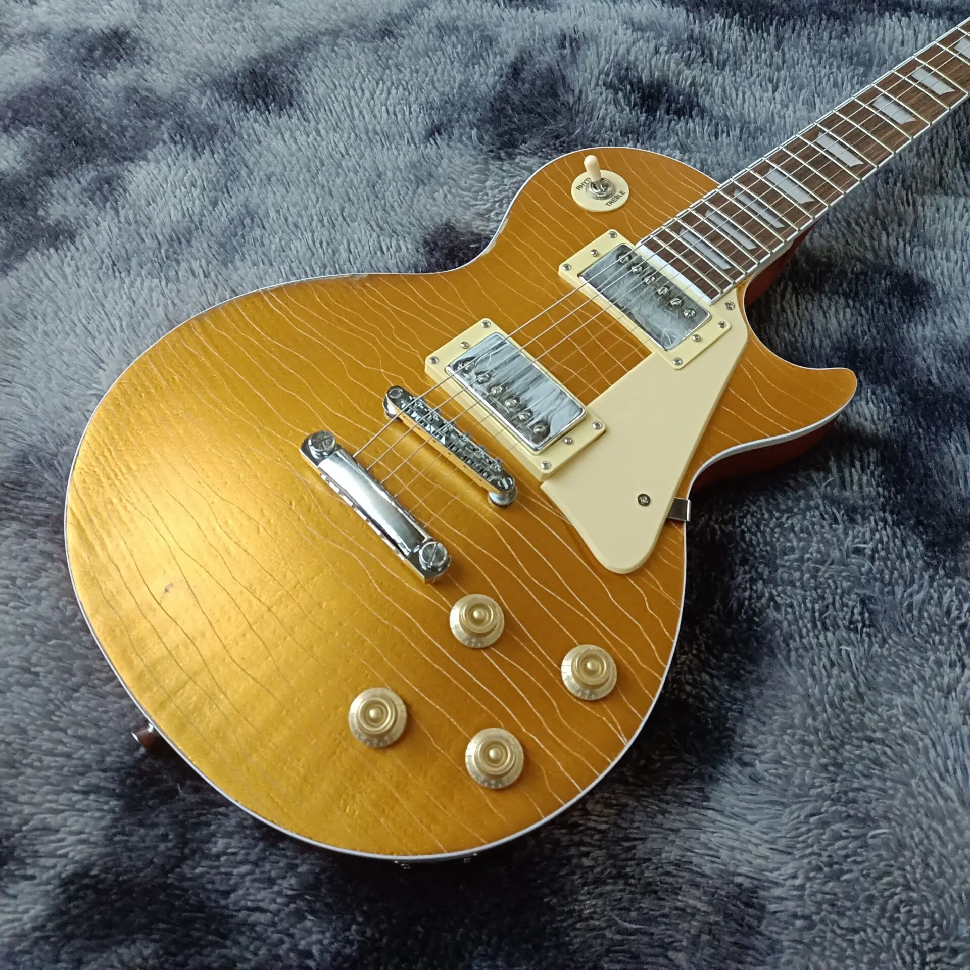 

2021! ВЫСОКОКАЧЕСТВЕННАЯ стандартная электрическая гитара золотого цвета, реликсы руками, корпус из красного дерева, фингерборд из палисандр...