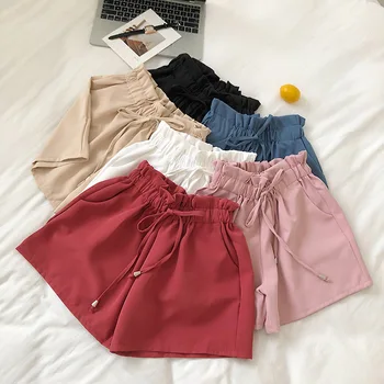 

UumaysariSummer new Korean solid color loose wild elastic waist lace flower bud wide leg shorts casual beach fashion sexy shorts