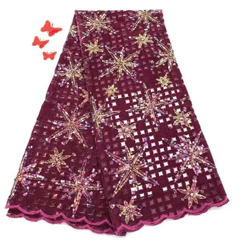 

High quality French embroidered tulle lace with Nigerian sequins was used in the wedding dress red